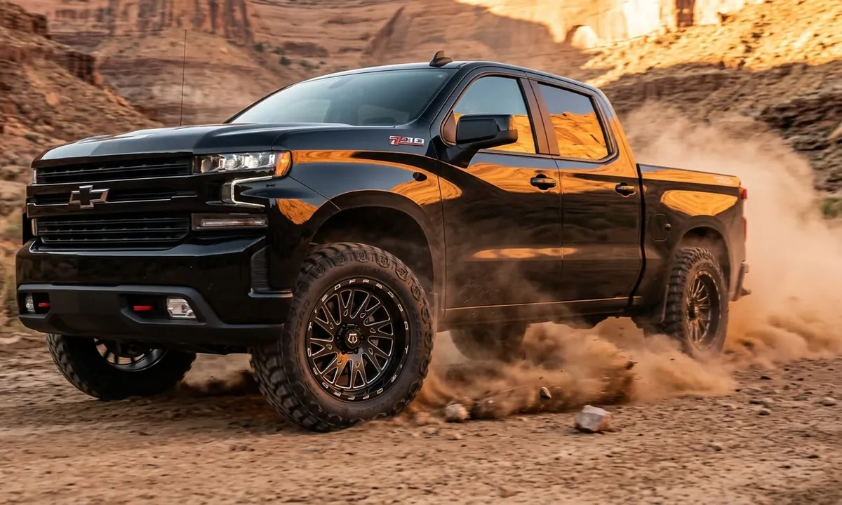 Hercules TIS TT1 on a pickup truck kicking up dust in a canyon